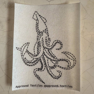 Visible mending pattern sticker featuring a giant squid design. 