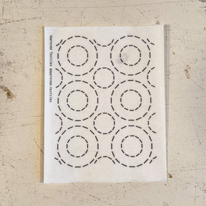 Visible mending pattern sticker featuring a grouping of large circles with smaller circles inside