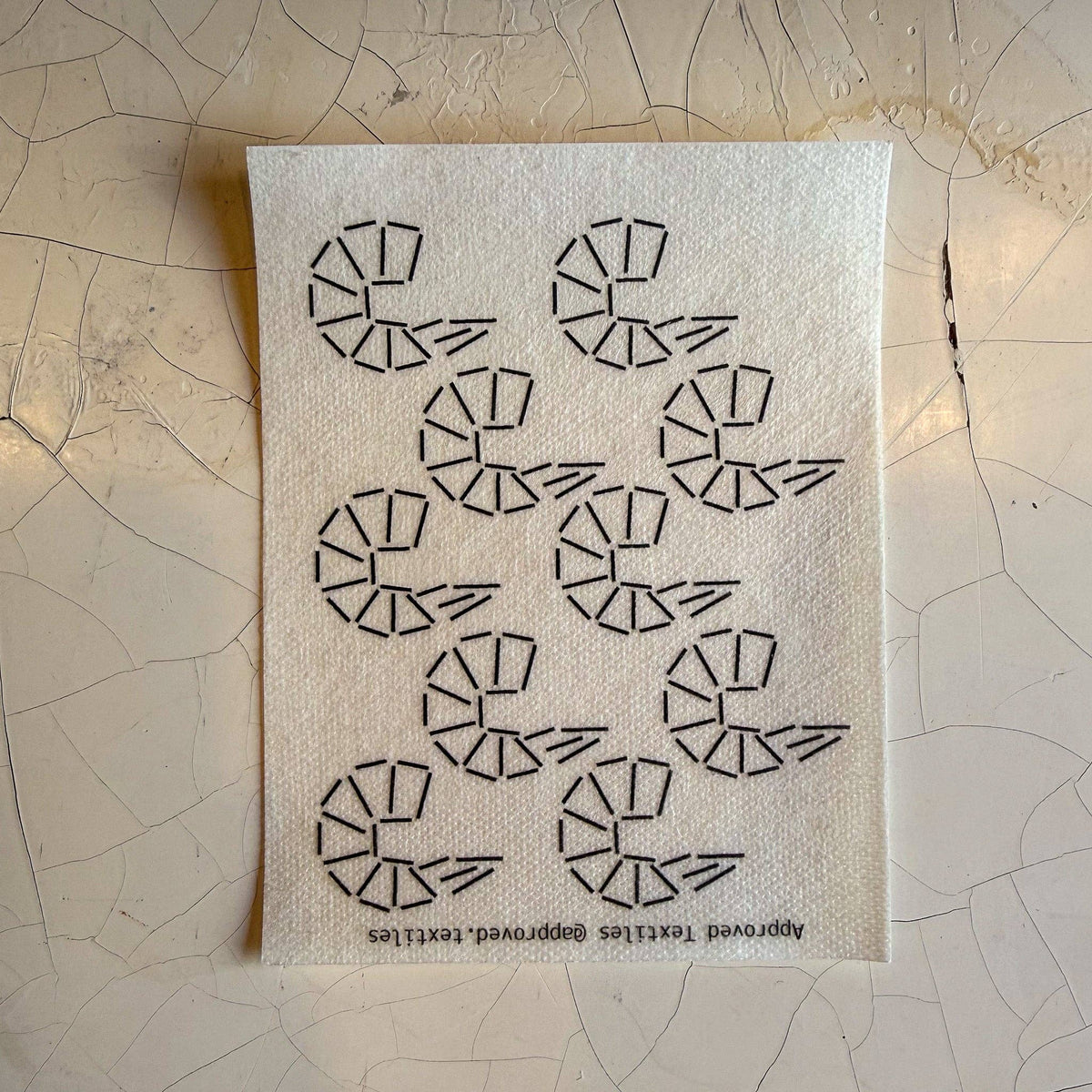Visible mending pattern sticker of a grouping of ten shrimp. 
