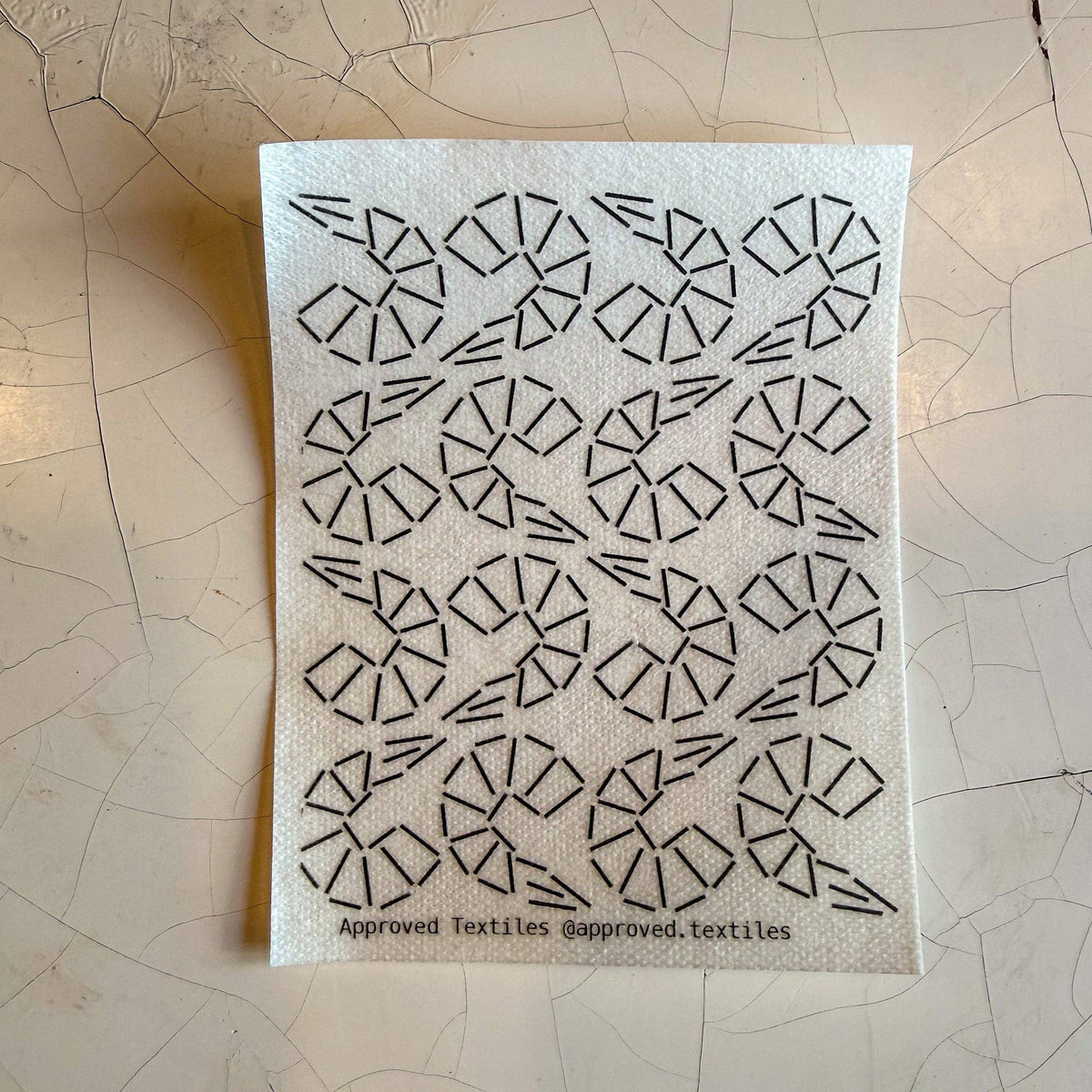 Visible mending pattern sticker featuring a tessellation of shrimp. 