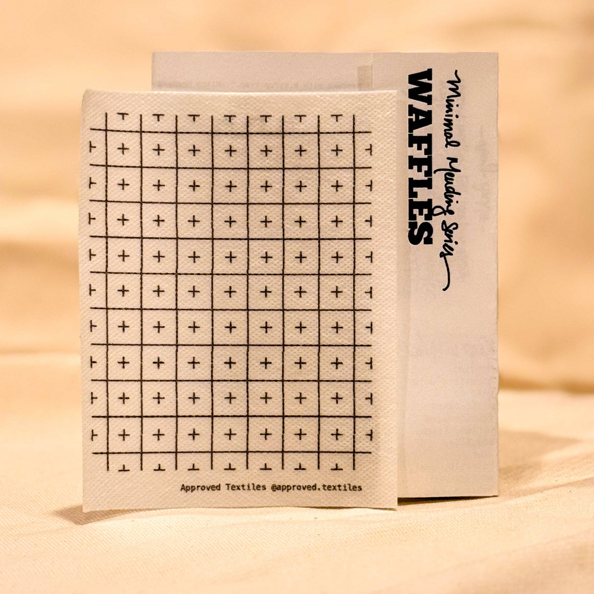 Visible mending pattern sticker featuring a grid pattern with plus signs in each square 