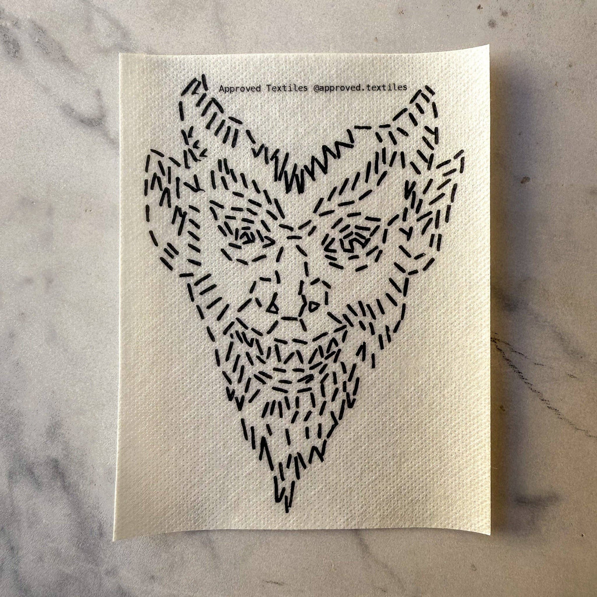 Visible mending pattern sticker featuring a devilish face 