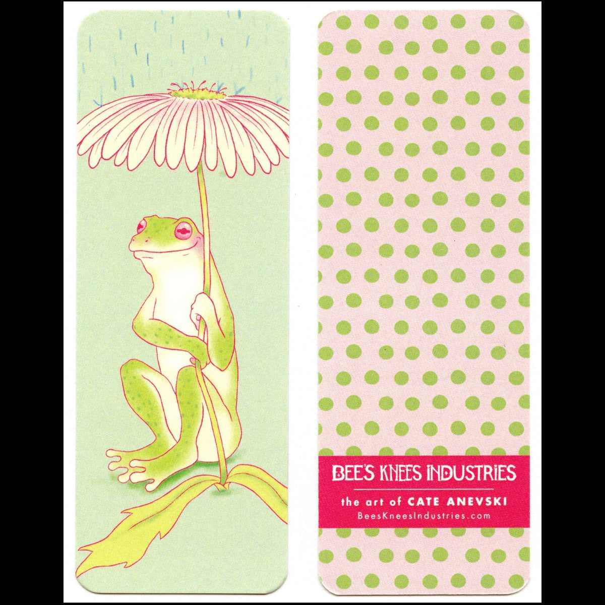 A bookmark that has a frog sitting underneath a daisy umbrella on one side and a pink background with green polka dots on the other.