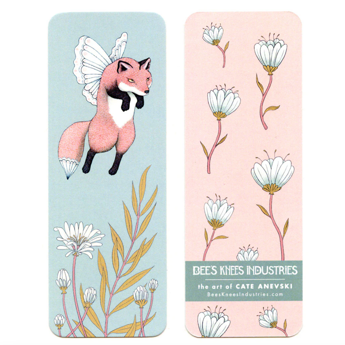 A bookmark that has a fox with white fairy wings and white flowers on one side and white flowers against a pink background on the other side.