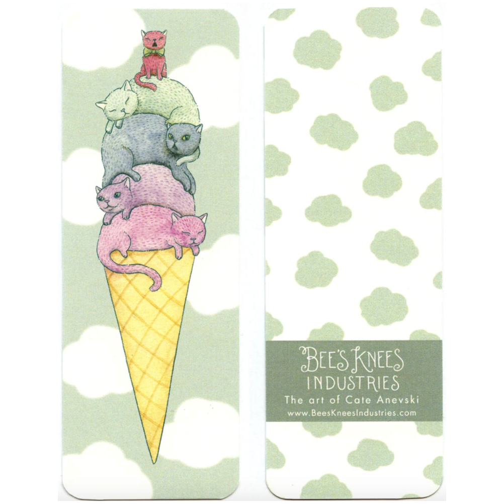A bookmark that has a pile of rainbow cats on top of an ice cream cone on one side and green cloud shapes on a white background on the other.