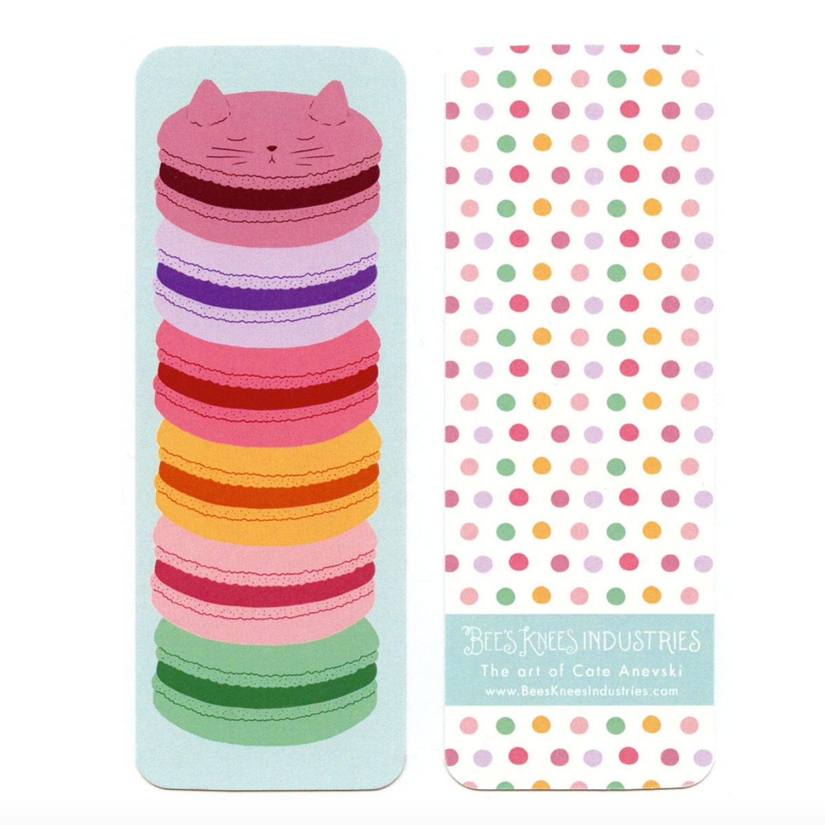 A bookmark with a stack of rainbow macarons with the top one shaped like a cat on one side and multicolor dots on a white background on the other. 