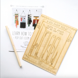 Wooden weaving loom set with instructions on a white background