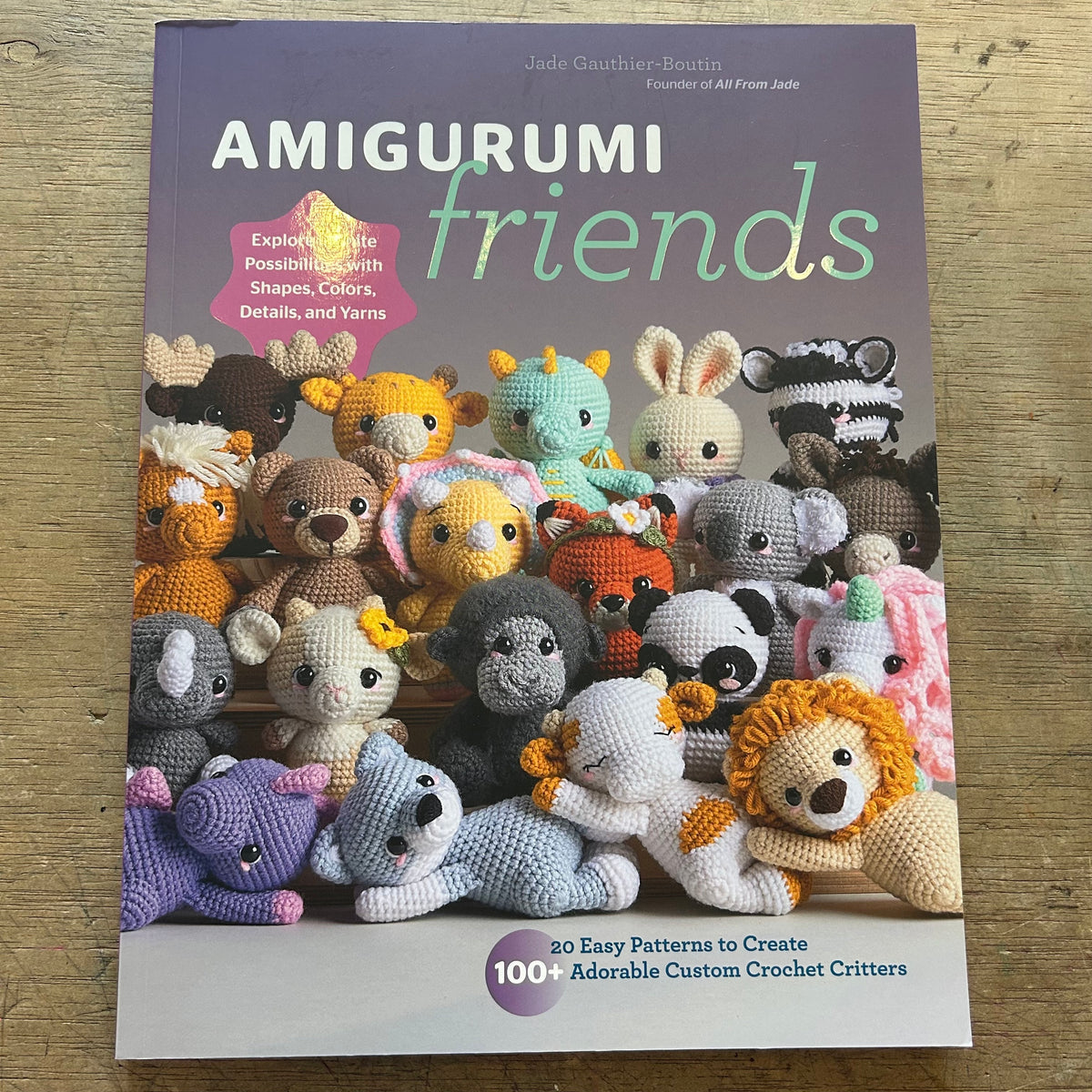A book cover featuring a large grouping of crochet plushie animals and the title "Amigurumi Friends"