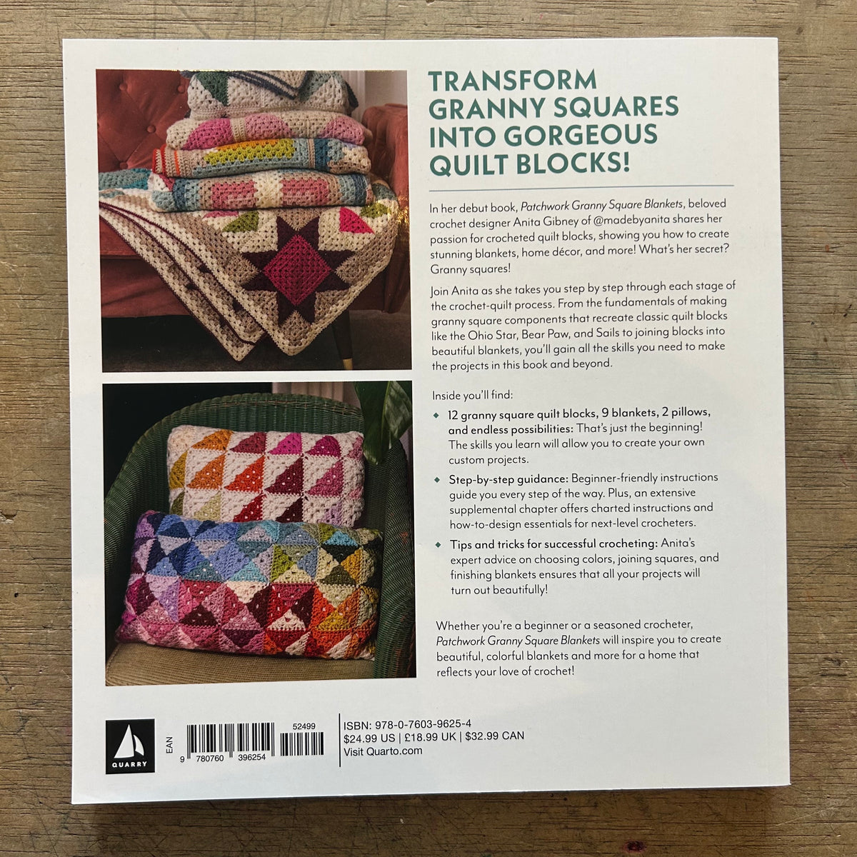 The back cover of the paperback book 'Patchwork Granny Square B' by Anita Geller, displayed flat on a dark wood background. The cover features a large photo of colorful handmade quilts and a list of included contents and instructions.