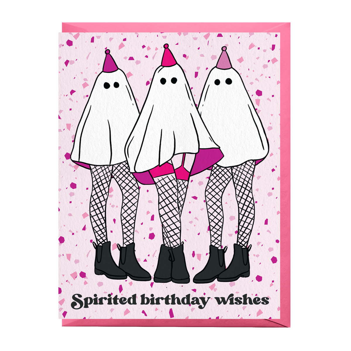 A greeting card with a light pink background speckled with small purple dots. The front features three cartoon ghosts wearing party hats, fishnet stockings, and black boots, with the text 'Spirited birthday wishes' at the bottom.