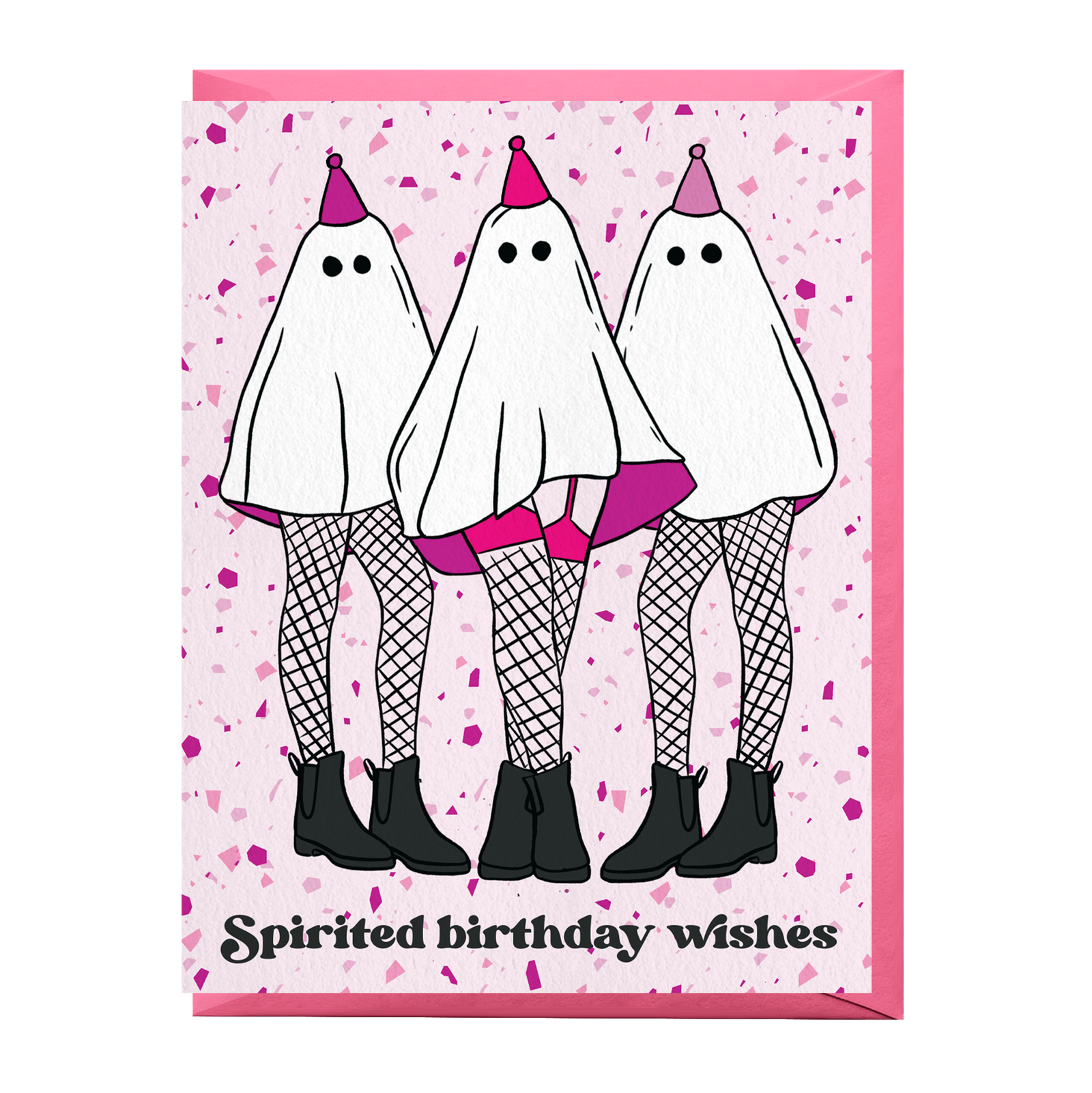 A greeting card with a light pink background speckled with small purple dots. The front features three cartoon ghosts wearing party hats, fishnet stockings, and black boots, with the text 'Spirited birthday wishes' at the bottom.