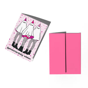 A pink Halloween greeting card set shown on a white background, with one card open to reveal ghost illustrations and the text 'Spirited birthday wishes'