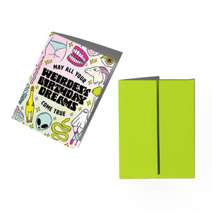 A greeting card with a colorful, quirky cartoon illustration and the text 'MAY ALL YOUR WEIRDEST BIRTHDAY DREAMS COME TRUE' shown next to a plain lime green envelope on a white background.