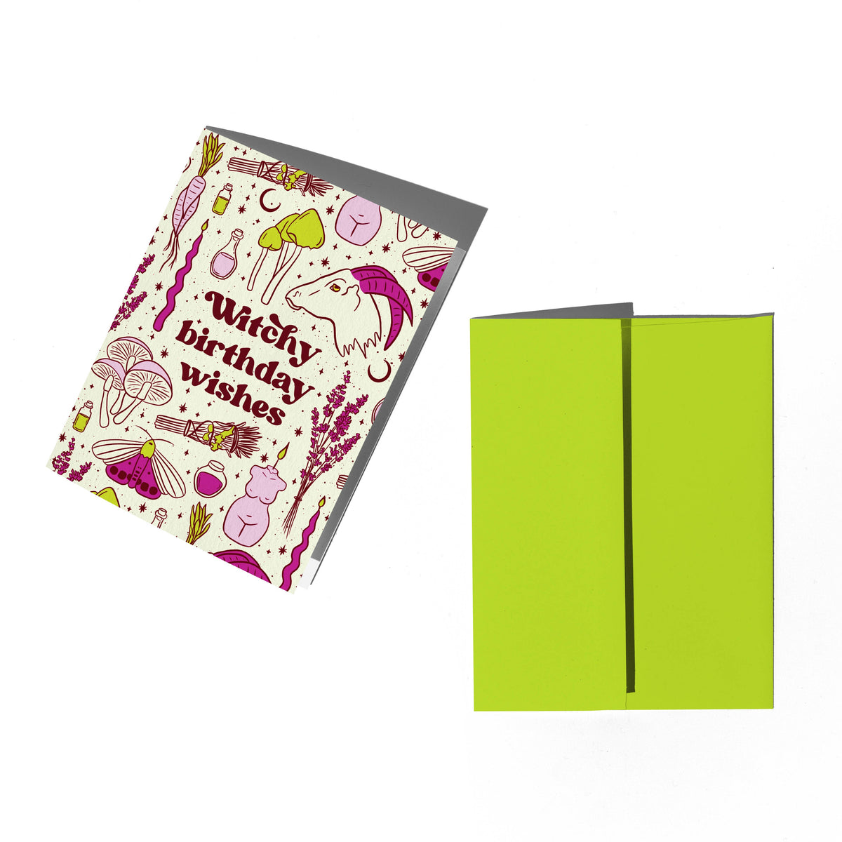 A greeting card set shown on a white background, featuring one card with a whimsical illustrated cover that reads 'Witchy birthday wishes' and a solid lime green envelope standing beside it.