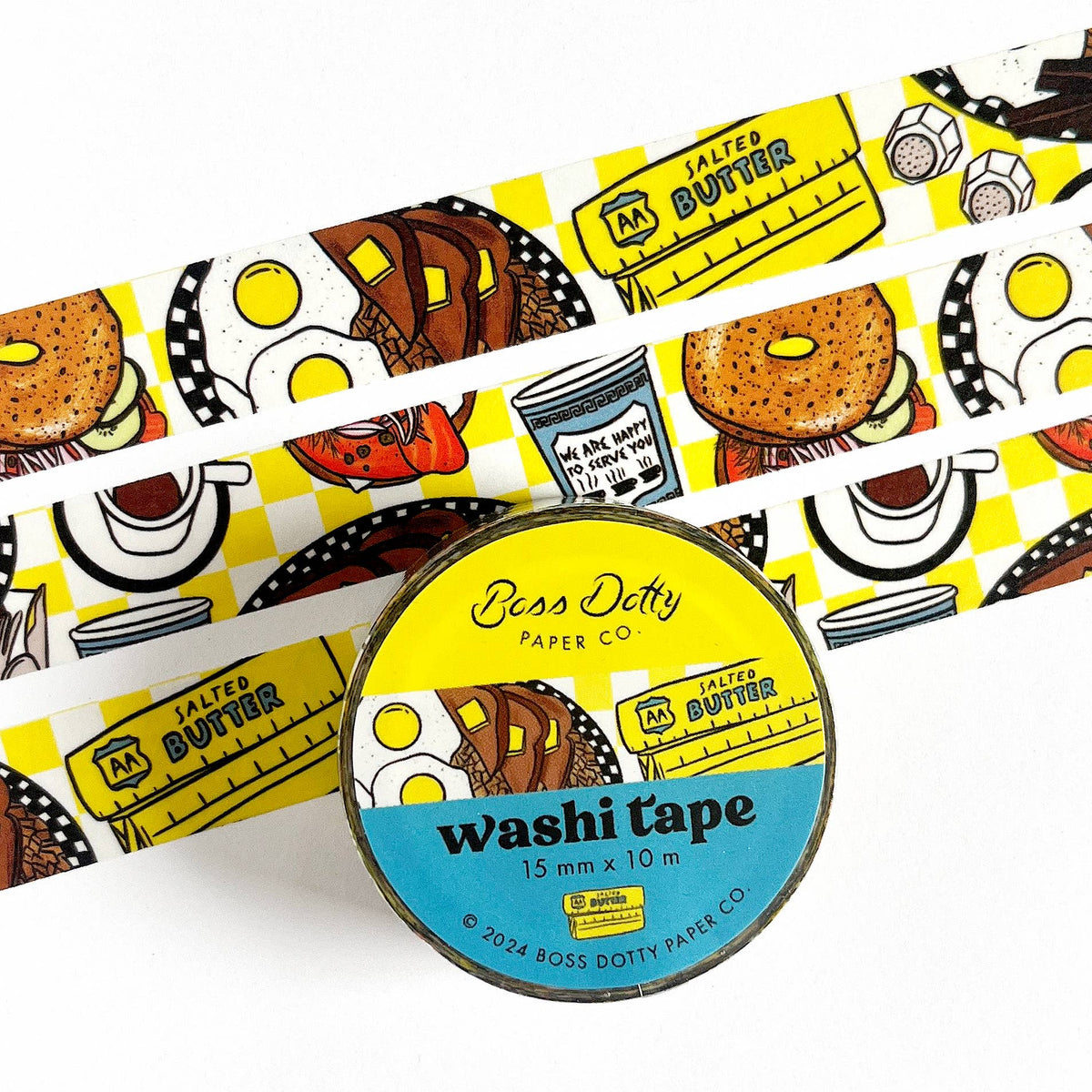 Washi tape with cartoon breakfast food design and 'Boss Dotty Paper Co' branding on a white background