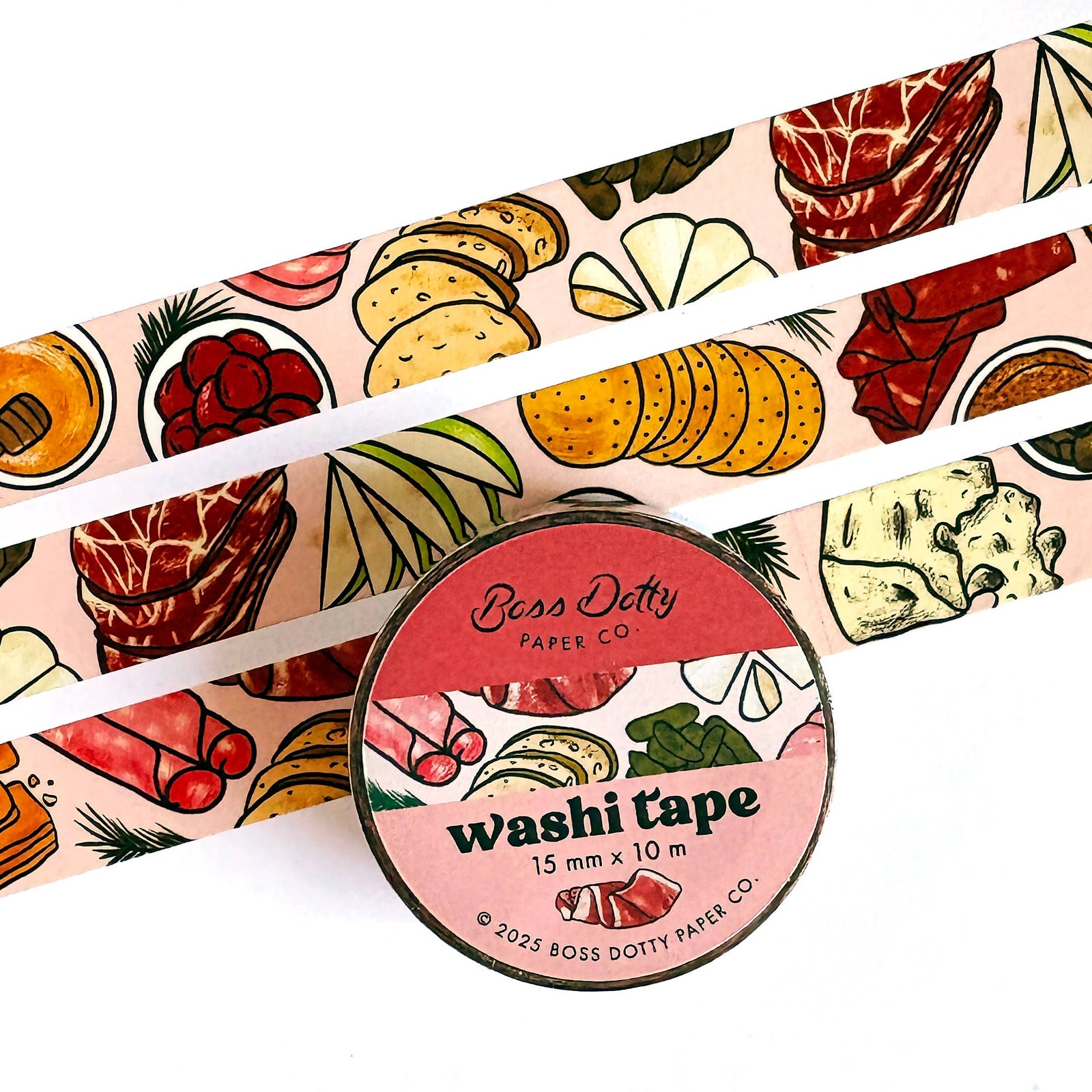 Washi tape with food-themed design and a circular container labeled 'Boss Dotty Paper Co'.
