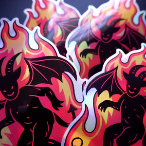Sticker design of a black demon with flames on a colorful background