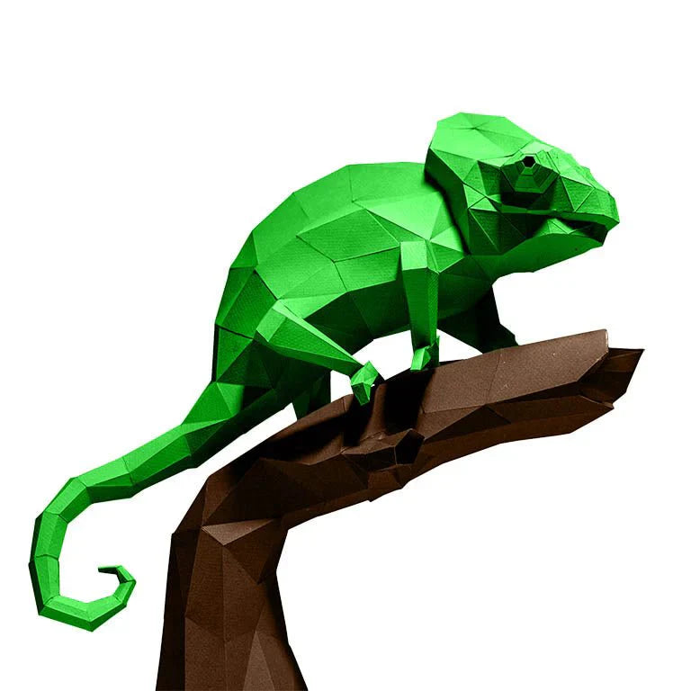 an example of a completed chameleon paper craft kit. He is standing on a stick and has a white background.