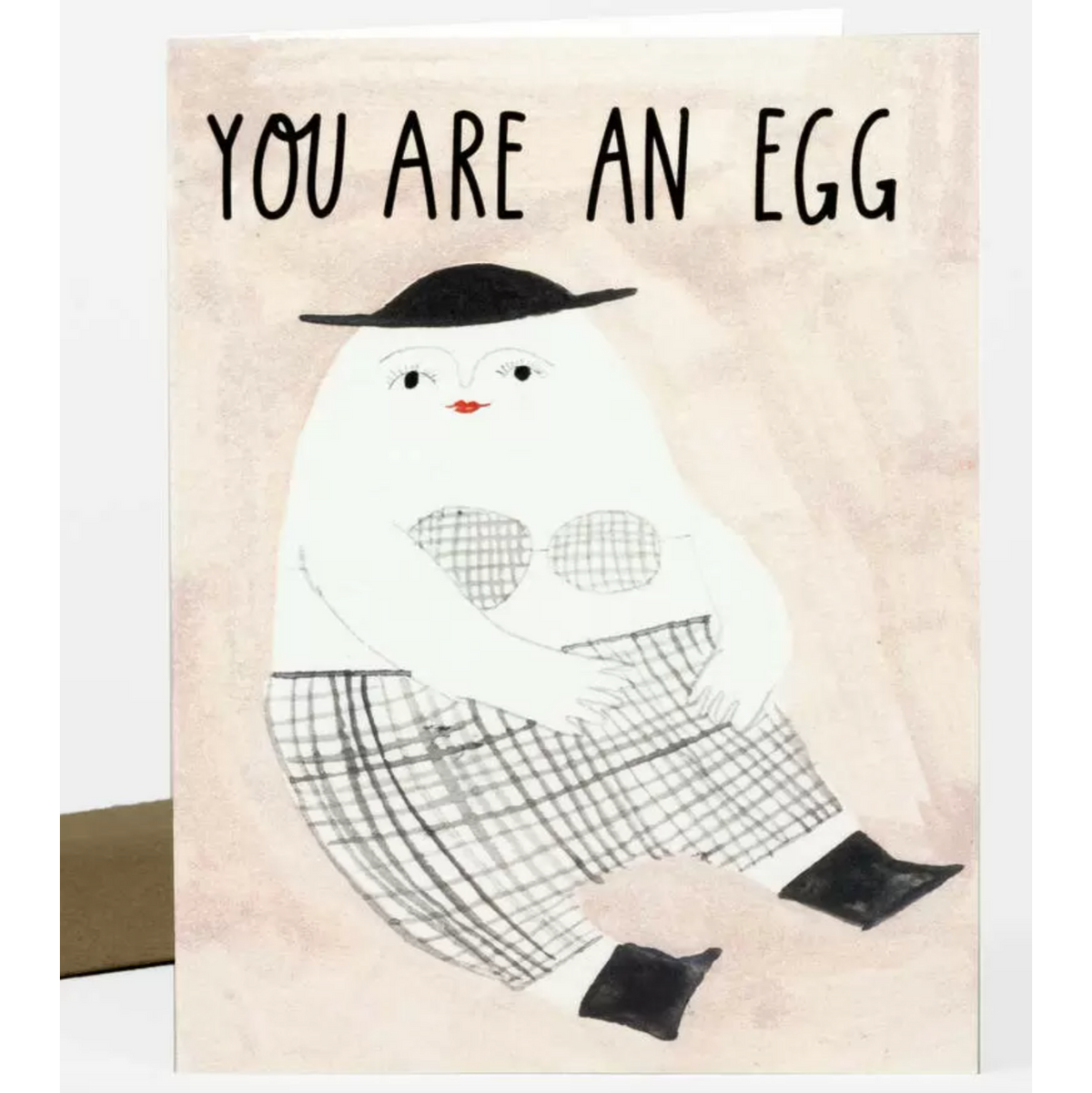 Card with a cartoon egg wearing a hat and skirt, text 'YOU ARE AN EGG' on a beige background.