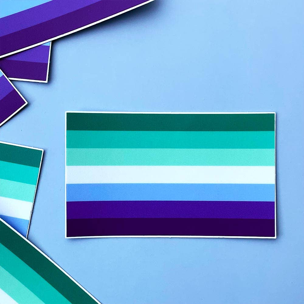 MLM flag sticker on a blue background