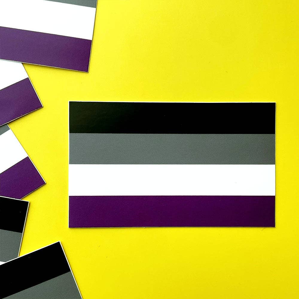 Asexual pride flag sticker on a yellow background 
