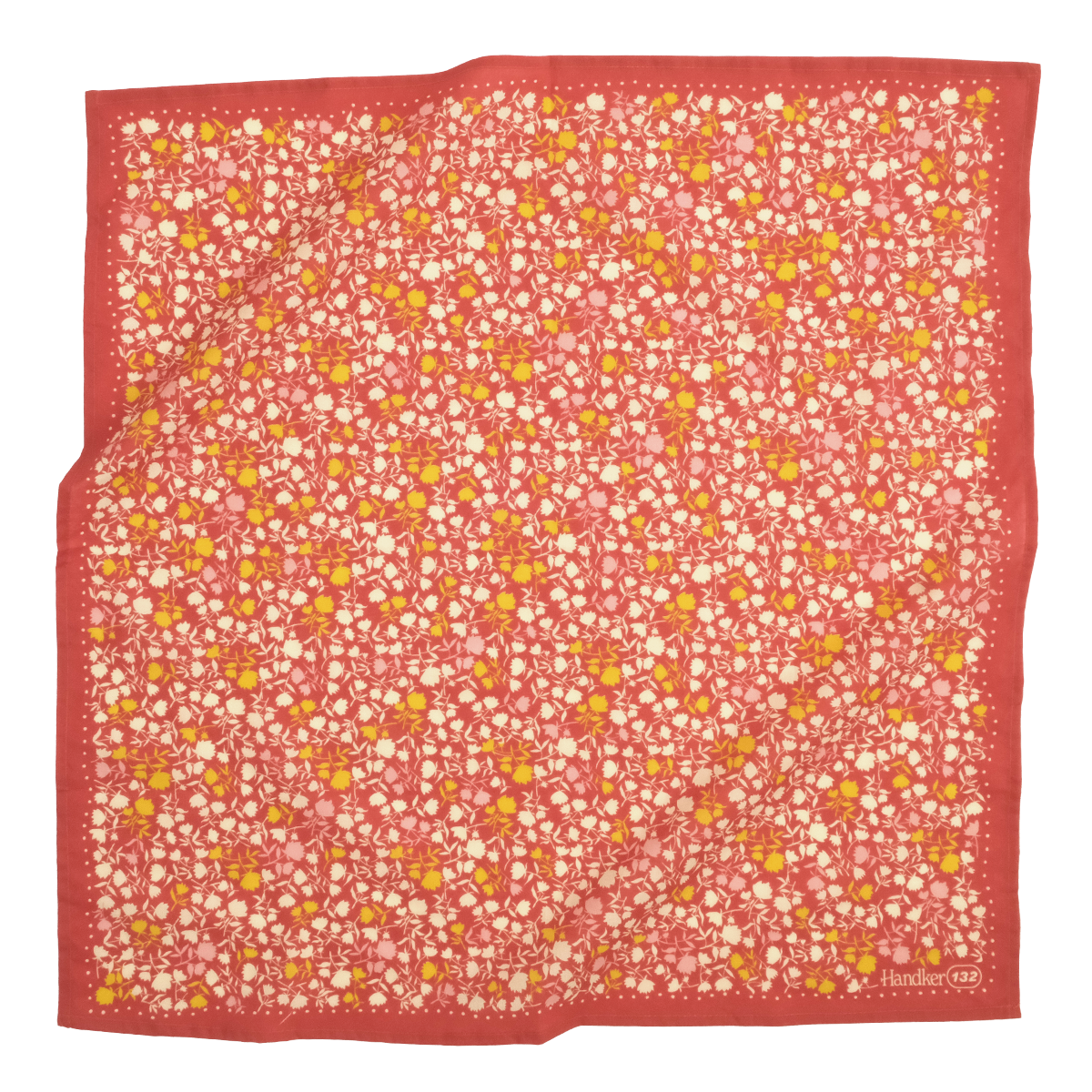 Red bandana with a small white and yellow floral pattern all over. 