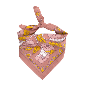 Pink floral bandana tied into a scarf. 
