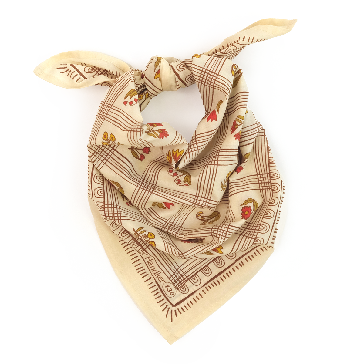 A cream colored bandana with a grid pattern tied into a scarf