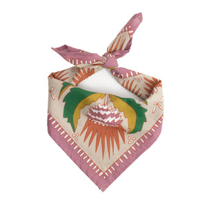 Floral patterned bandana tied into a scarf against a white background. 