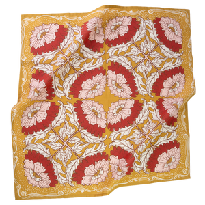 Yellow bandana with a pink, red and cream colored floral pattern. 