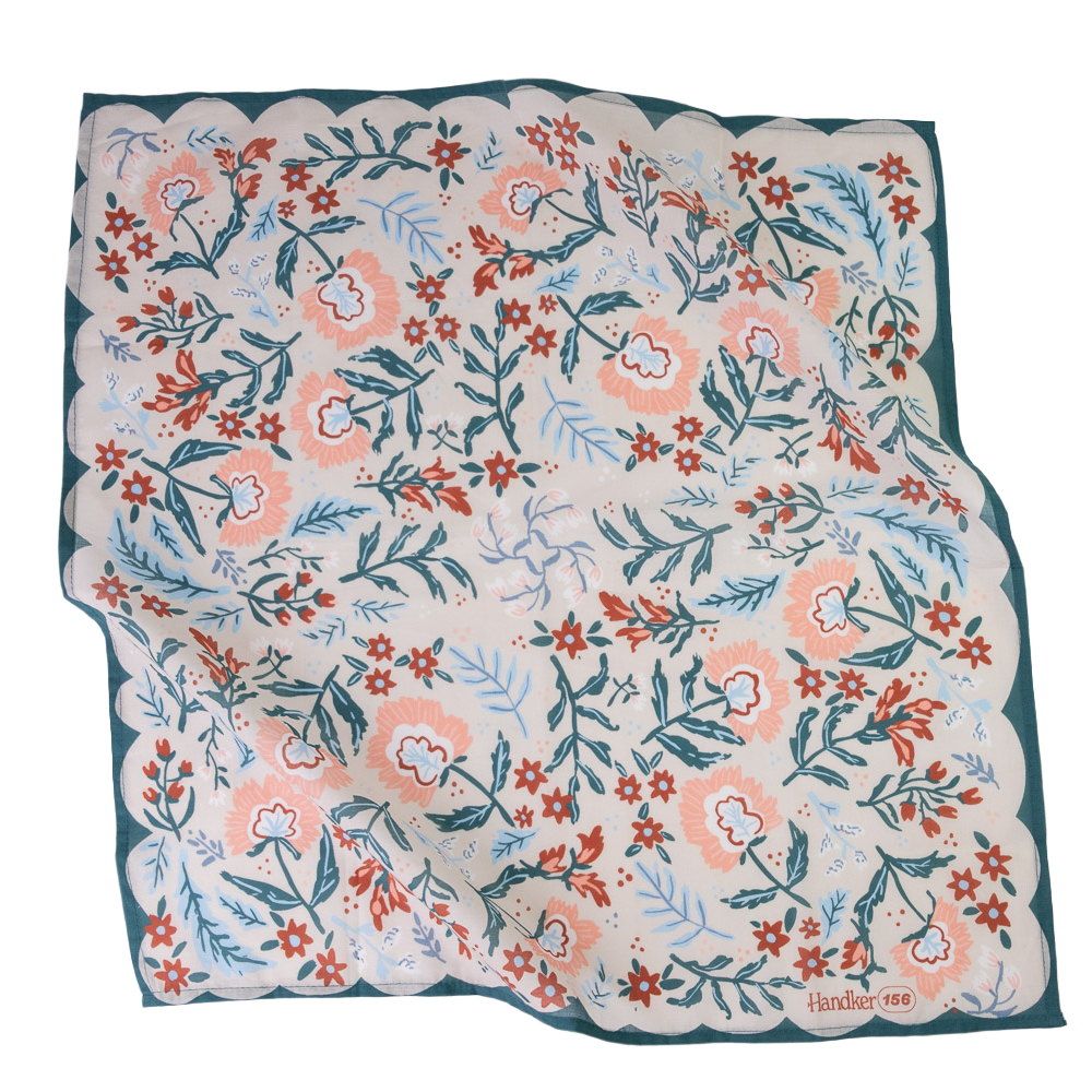 A floral patterned bandana in shades of blue, pink, and red. 