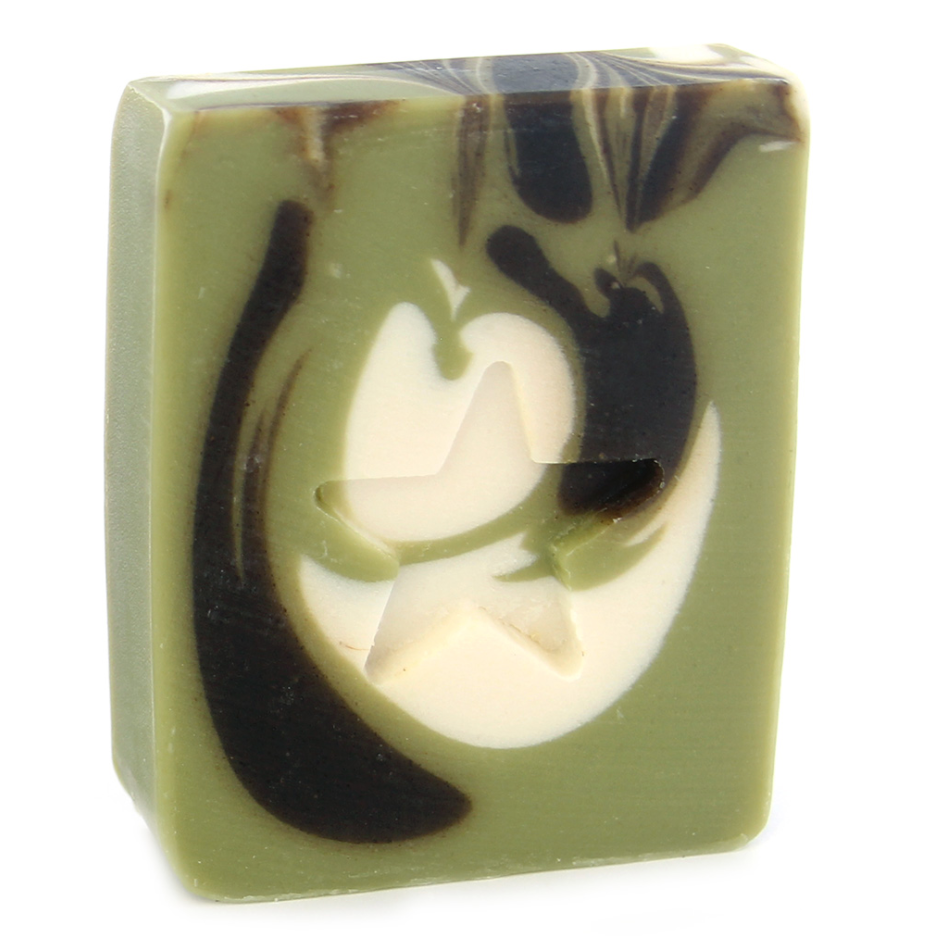 A bar of handmade soap with green, black, and white color swirls and a floral pattern on the top