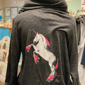Dark gray sweatshirt with a roller skating unicorn graphic on a mannequin.