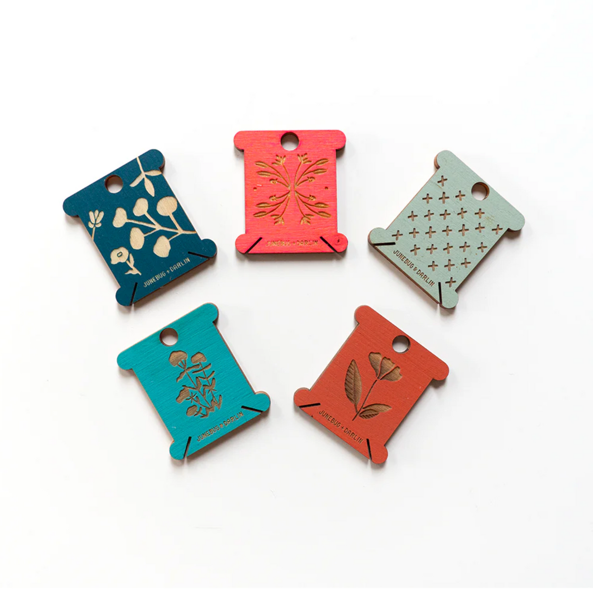 More examples of the designs and colors of floss bobbins you might receive in your random pack. 