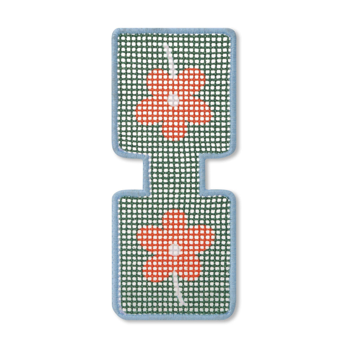 Needlepoint pattern featuring a red flower on a green background with a blue border. 