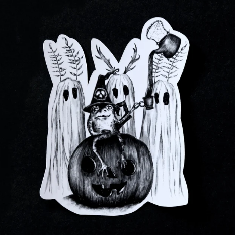 A black and white hand-drawn sticker featuring a frog wearing a witch hat sitting on a jack-o-lantern surrounded by three ghosts and a tea kettle pouring tea into the frog's cup