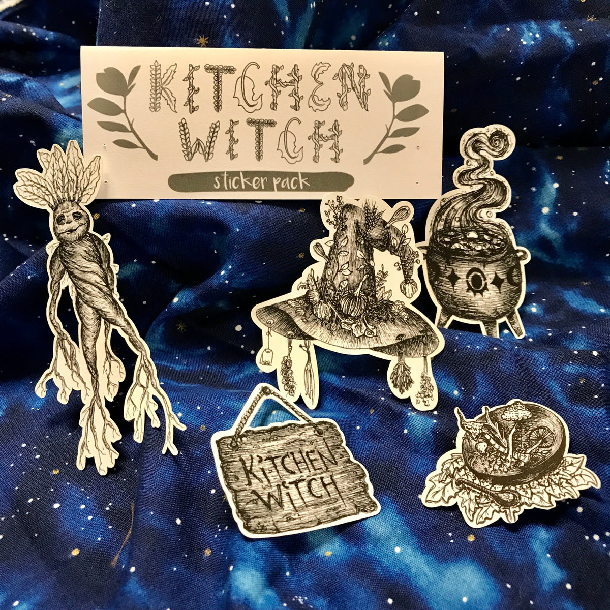 Grouping of five "kitchen witch" stickers featuring a creature made out of roots, a witch's hat, a steaming cauldron, a bowl of mushrooms, and a wooden sign that says "kitchen witch"