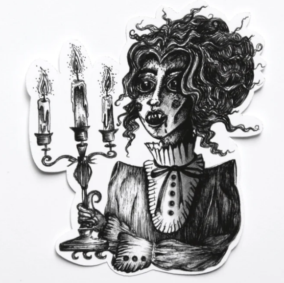A black and white hand-drawn sticker of a creepy vampire lady holding a candelabra.