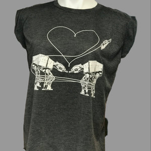 Dark gray t-shirt with Love AT-AT First Sight design on a mannequin in a store setting.