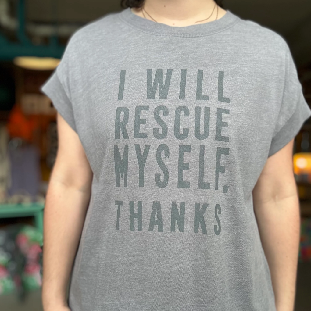 Person wearing a gray t-shirt with 'I WILL RESCUE MYSELF, THANKS' text.