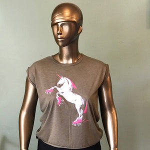 Gold plus-size mannequin wearing a heather olive rolled cuff muscle tee shirt with a hot pink and white roller skating unicorn graphic. 