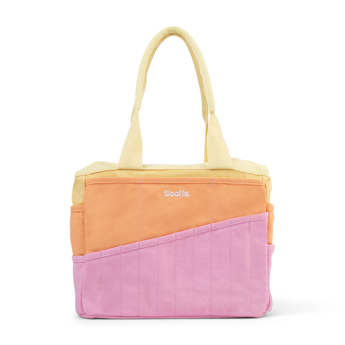 A color-blocked canvas tote bag by Soolla with a pale yellow top, a peach-orange middle section, and a pink bottom section, shown on a clean white background.