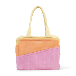 A color-blocked canvas tote bag by Soolla with a pale yellow top, a peach-orange middle section, and a pink bottom section, shown on a clean white background.