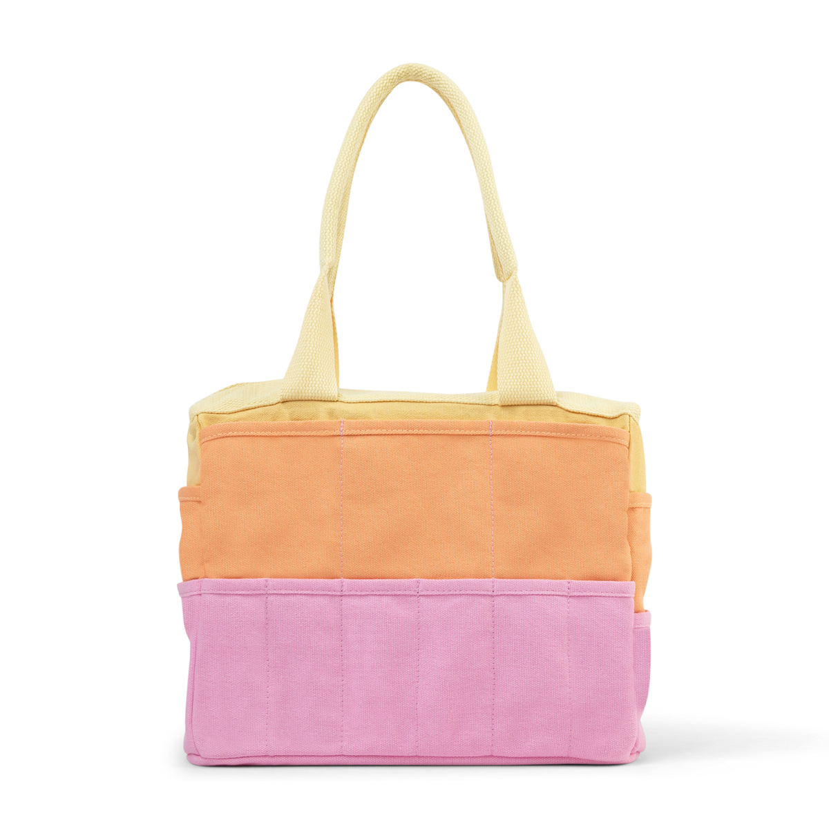 Color-blocked tote bag with yellow, orange, and pink sections on a white background