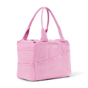 Pink tote bag with a visible brand logo on a white background