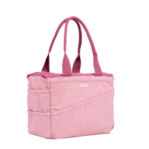 Pink tote bag with 'Soolla' branding on a white background