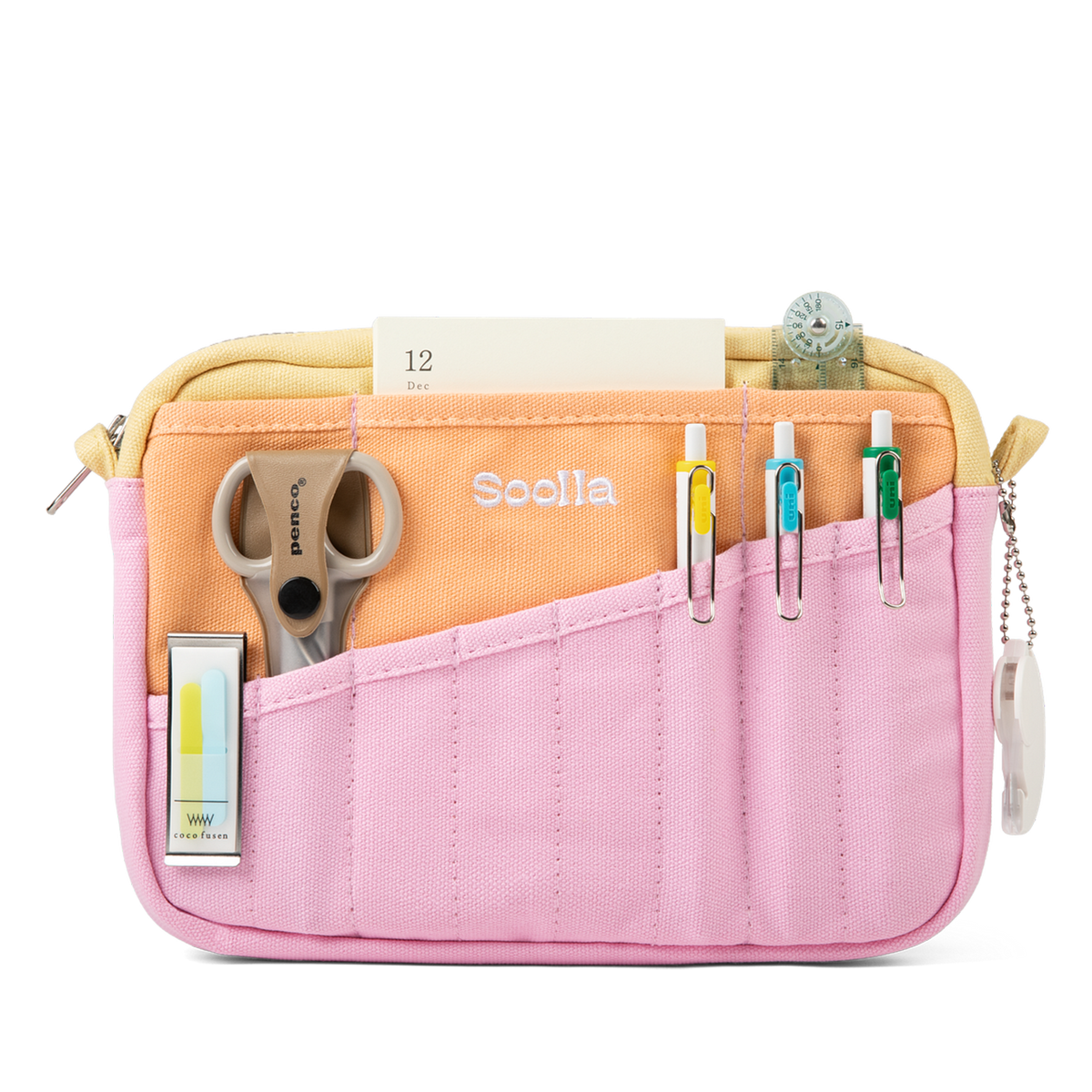 Pink pencil case with compartments containing stationery items on a white background