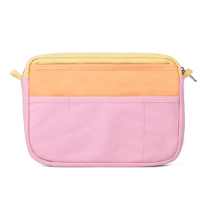 Two-tone pink and yellow pouch on a black background