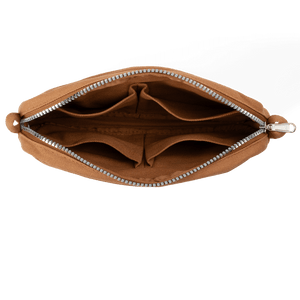 Brown pouch with a zipper on a black background
