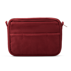 Red pouch with multiple compartments on a white background